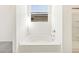 Cozy soaking tub in this bright bathroom at 3805 N Camden Dr, Florence, AZ 85132