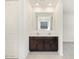 Bright bathroom featuring a double sink vanity with modern hardware at 3805 N Camden Dr, Florence, AZ 85132