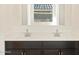 Close up of a modern bathroom vanity with double sinks at 3805 N Camden Dr, Florence, AZ 85132