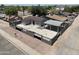 Aerial view of a single-Gathering home with a fenced yard and carport at 404 E Centre Ave, Buckeye, AZ 85326