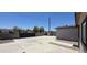View of the spacious backyard and block fencing at 404 E Centre Ave, Buckeye, AZ 85326