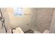 Bathroom with tile floors and stand up shower at 404 E Centre Ave, Buckeye, AZ 85326