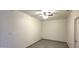 View of the bedroom with ceiling fan and tile floors at 404 E Centre Ave, Buckeye, AZ 85326