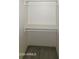 A well-organized closet with rods and shelves offers ample storage space and modern flooring at 404 E Centre Ave, Buckeye, AZ 85326