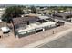 Charming single-story home featuring a carport, pool and a secure gated yard at 404 E Centre Ave, Buckeye, AZ 85326