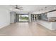Open-concept layout seamlessly connects the living area to the modern kitchen with a large island at 4143 E Sidesaddle Rd, San Tan Valley, AZ 85140