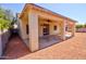 View of the backyard and covered patio at 639 E Palo Verde St, Casa Grande, AZ 85122