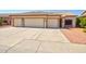 Charming home featuring a three-car garage and desert landscaping for low maintenance and curb appeal at 639 E Palo Verde St, Casa Grande, AZ 85122