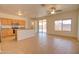 Bright, open-concept kitchen with an island, ample counter space, and sliding doors to the backyard at 639 E Palo Verde St, Casa Grande, AZ 85122