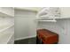 Walk-in closet with shelves, hanging racks and storage at 7324 S Bonarden Ln, Tempe, AZ 85283