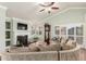 Comfortable living room featuring a fireplace and custom built-in shelves at 7324 S Bonarden Ln, Tempe, AZ 85283