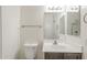 Bathroom features wood vanity and lighting fixture at 854 S San Marcos Bldg 6 -- # A, Apache Junction, AZ 85120