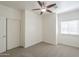 Cozy bedroom with carpet and ceiling fan at 854 S San Marcos Bldg 6 -- # A, Apache Junction, AZ 85120