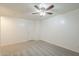 A well-lit bedroom includes neutral carpet, white walls, trim, and a standard hinged door at 854 S San Marcos Bldg 6 -- # A, Apache Junction, AZ 85120