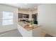Kitchen boasts granite counters and modern stainless steel appliances at 854 S San Marcos Bldg 6 -- # A, Apache Junction, AZ 85120