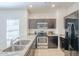Kitchen featuring stainless steel appliances and granite countertops at 854 S San Marcos Bldg 6 -- # A, Apache Junction, AZ 85120