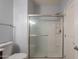 An enclosed shower with glass doors and a white interior at 854 S San Marcos Dr Bldg 6 Dr # D, Apache Junction, AZ 85120