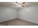 Standard bedroom with gray walls, neutral carpeting, and a contemporary ceiling fan, creating a comfortable, blank canvas at 854 S San Marcos Dr Bldg 6 Dr # D, Apache Junction, AZ 85120