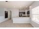 Kitchen featuring stainless steel appliances, granite countertops, and dark cabinets at 854 S San Marcos Dr Bldg 6 Dr # D, Apache Junction, AZ 85120