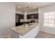 Kitchen featuring granite countertops, stainless steel appliances, and dark cabinets at 854 S San Marcos Dr Bldg 6 Dr # D, Apache Junction, AZ 85120