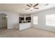 Open-concept living room and kitchen area with lots of natural light at 854 S San Marcos Dr Bldg 6 Dr # D, Apache Junction, AZ 85120