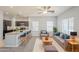 Modern living room and kitchen, with plush seating, island countertop, and lots of natural light at 854 S San Marcos Dr Bldg 6 Dr # D, Apache Junction, AZ 85120