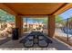 The community picnic area featuring tables and seating, as well as a barbeque and trash can for easy cleanup at 854 S San Marcos Dr Bldg 6 Dr # D, Apache Junction, AZ 85120