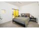 Bright bedroom with modern decor, stylish bedding, and plenty of natural light at 1111 W University Dr # 1017, Tempe, AZ 85281