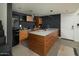 Modern kitchen featuring custom wood cabinets, stainless steel appliances, and sleek countertops at 1111 W University Dr # 1017, Tempe, AZ 85281