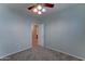 Bedroom featuring neutral walls, carpet and an open doorway at 1120 W Desert Hollow Dr, San Tan Valley, AZ 85143