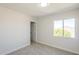 Bedroom featuring a large window that lets in lots of natural light at 12813 W Paradise Dr, El Mirage, AZ 85335