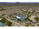 Beautiful aerial view of the house and property with large inground pool at 13074 E Saddlehorn Trl, Scottsdale, AZ 85259