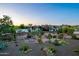 Expansive backyard landscaping featuring desert plants and mountain views at 13074 E Saddlehorn Trl, Scottsdale, AZ 85259