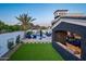 Backyard view featuring a pool, mountain views, and manicured lawn at 13074 E Saddlehorn Trl, Scottsdale, AZ 85259