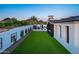 Backyard featuring a pool, mountain views, and manicured lawn at 13074 E Saddlehorn Trl, Scottsdale, AZ 85259