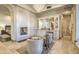 Elegant bathroom with tiled walls, fireplace, and a large vanity mirror at 13074 E Saddlehorn Trl, Scottsdale, AZ 85259