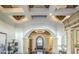 Grand foyer with arched doorways, decorative lighting, and detailed finishes at 13074 E Saddlehorn Trl, Scottsdale, AZ 85259