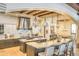 Well-appointed kitchen with an island, breakfast bar, stainless steel appliances, and pendant lighting at 13074 E Saddlehorn Trl, Scottsdale, AZ 85259