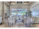 Living room with neutral colors and glass windows overlooking the patio at 13074 E Saddlehorn Trl, Scottsdale, AZ 85259