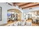 Spacious living room boasts a wet bar, beamed ceilings, and an open floor plan at 13074 E Saddlehorn Trl, Scottsdale, AZ 85259