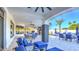 Covered patio featuring fireplace, TV, with many seating options at 13074 E Saddlehorn Trl, Scottsdale, AZ 85259
