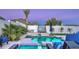 Backyard pool with basketball hoop, mountain views, and lounge seating at 13074 E Saddlehorn Trl, Scottsdale, AZ 85259