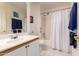 Bright bathroom featuring a shower and vanity with ample counter space at 1362 E Cherry Hills Dr, Chandler, AZ 85249