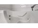 Close up of walk-in white tub with jets and shower fixture at 1362 E Cherry Hills Dr, Chandler, AZ 85249