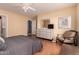 Tranquil bedroom featuring a dresser, chair, and soft decor, creating a relaxing retreat at 1362 E Cherry Hills Dr, Chandler, AZ 85249