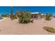 Well-maintained home with desert landscaping and mature cacti for a Southwest appeal at 1362 E Cherry Hills Dr, Chandler, AZ 85249