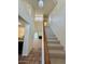 Inviting entryway featuring a staircase and views into the home's living spaces at 14002 N 49Th Ave # 1021, Glendale, AZ 85306
