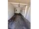 Empty garage with built in shelving offers lots of room for storage at 14002 N 49Th Ave # 1021, Glendale, AZ 85306