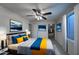 A stylish bedroom features a comfortable bed, modern decor, and walk-in closet creating a cozy retreat at 16426 N 49Th St, Scottsdale, AZ 85254