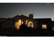 Exterior view of a charming single-Gathering home, highlighted by a well-lit front and architectural details at 16426 N 49Th St, Scottsdale, AZ 85254